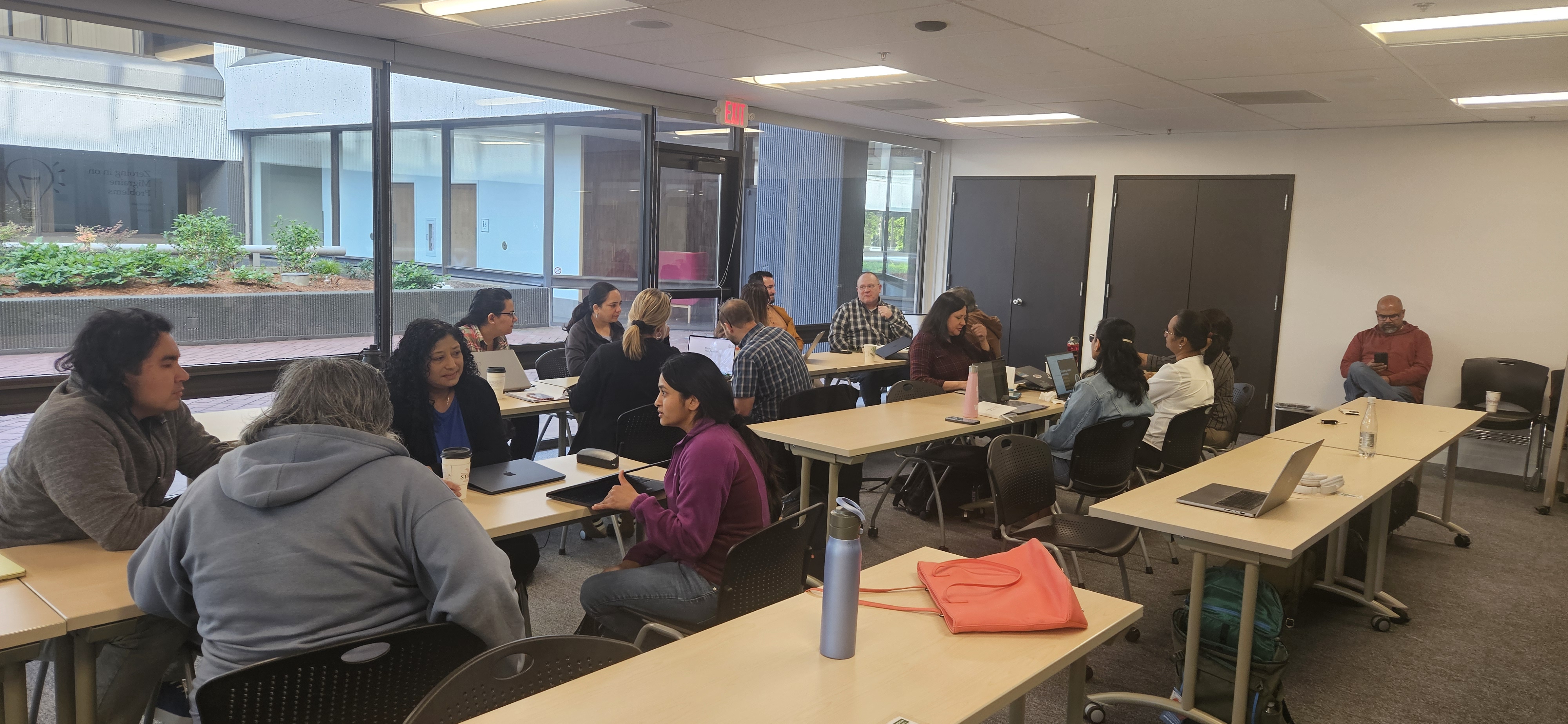 Students discussing ideas in teams.